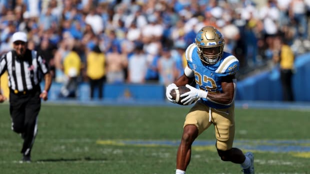 UCLA Bruins running back Keegan Jones carries the football.